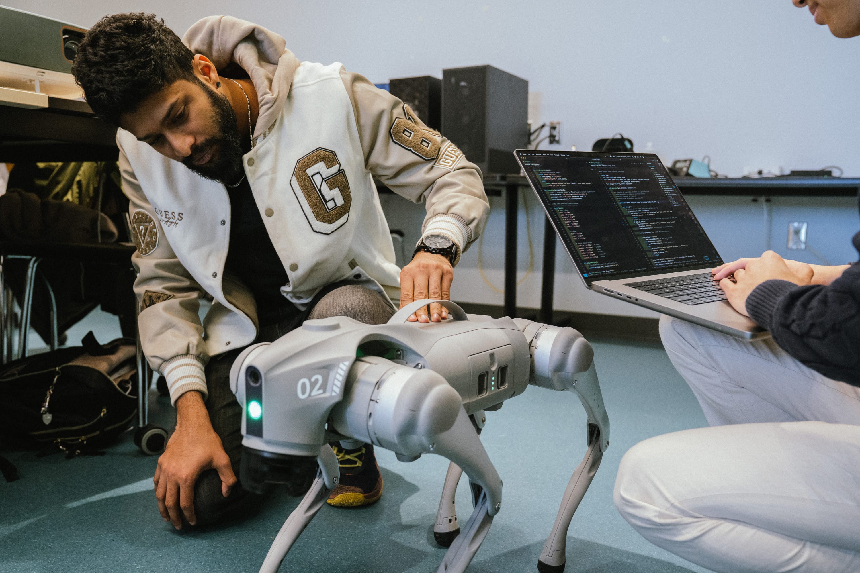 HURON lab members working with a robot