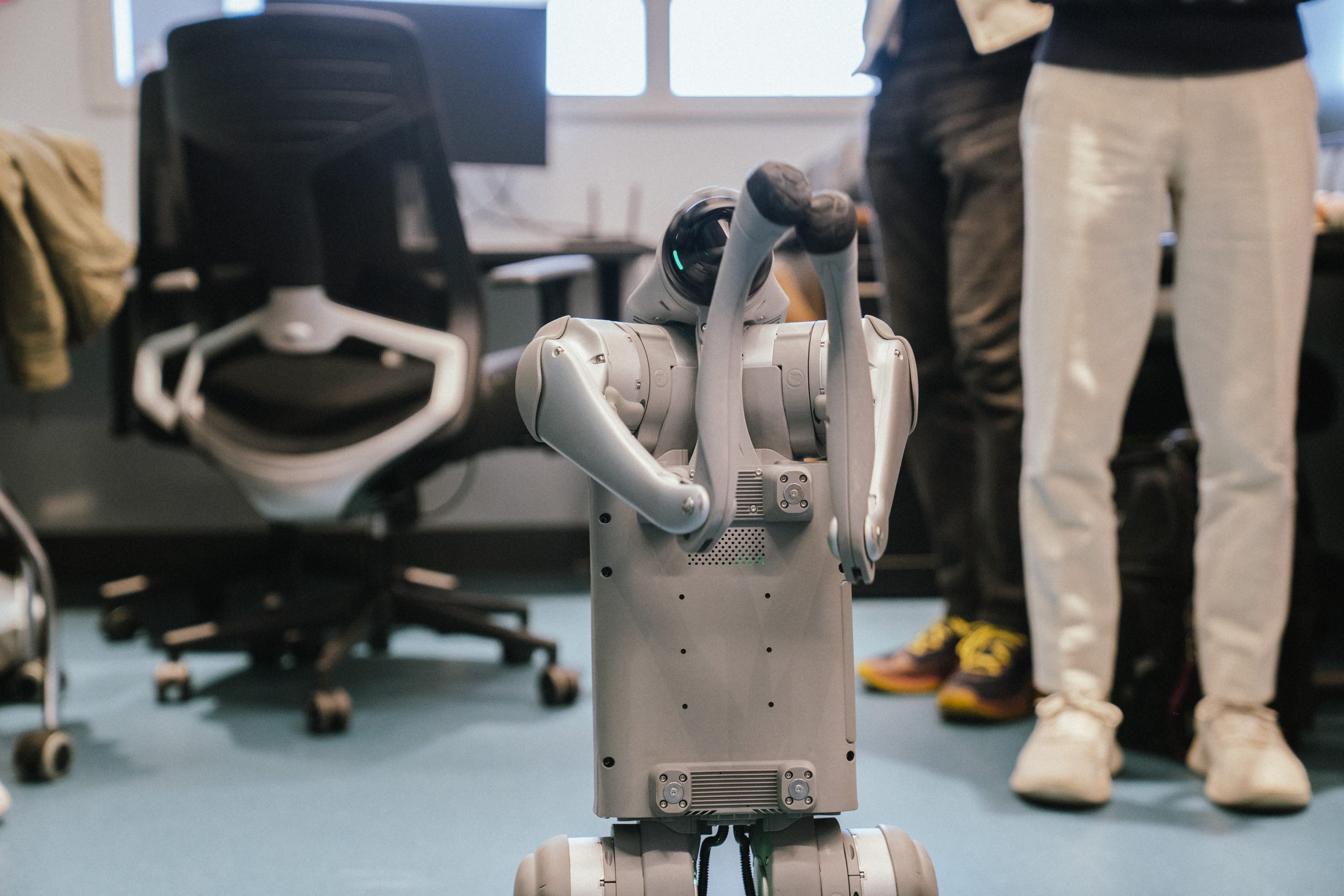HURON lab members working with a robot
